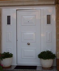 Puerta panel de acceso a vivienda estampación de color blanco