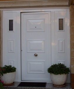 Puerta panel de acceso a vivienda estampación de color blanco Puerta panel de acceso a vivienda estampación de color blanco