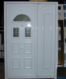 Puerta panel de de acceso a vivienda con doble hoja acristalada de color blanco